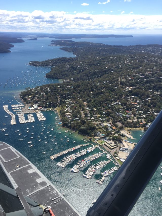 Viewed from the air, you can see some of the many bays that line Sydney Harbor, as well as a marina